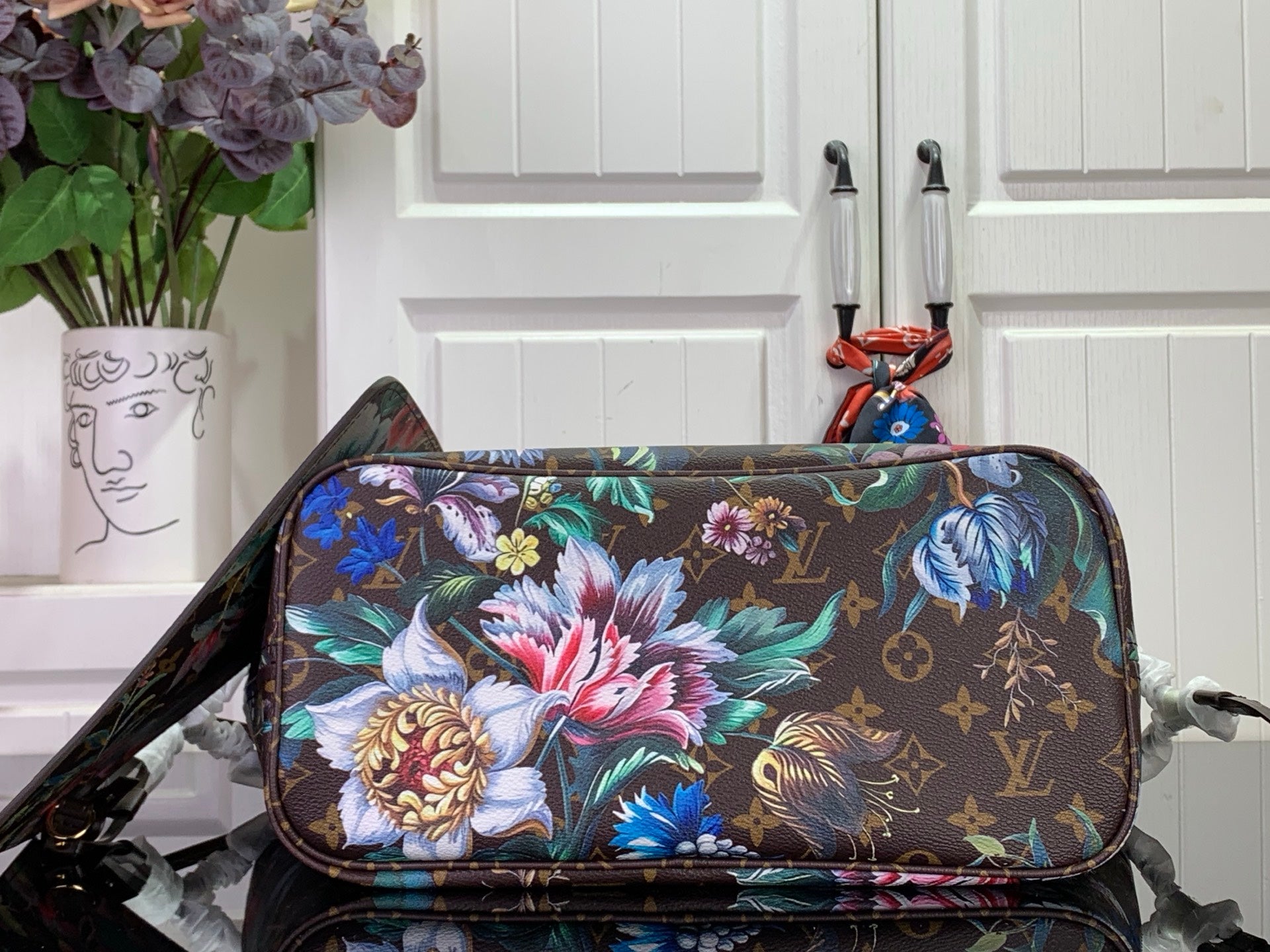 Floral monogram tote bag with zip top and front flap