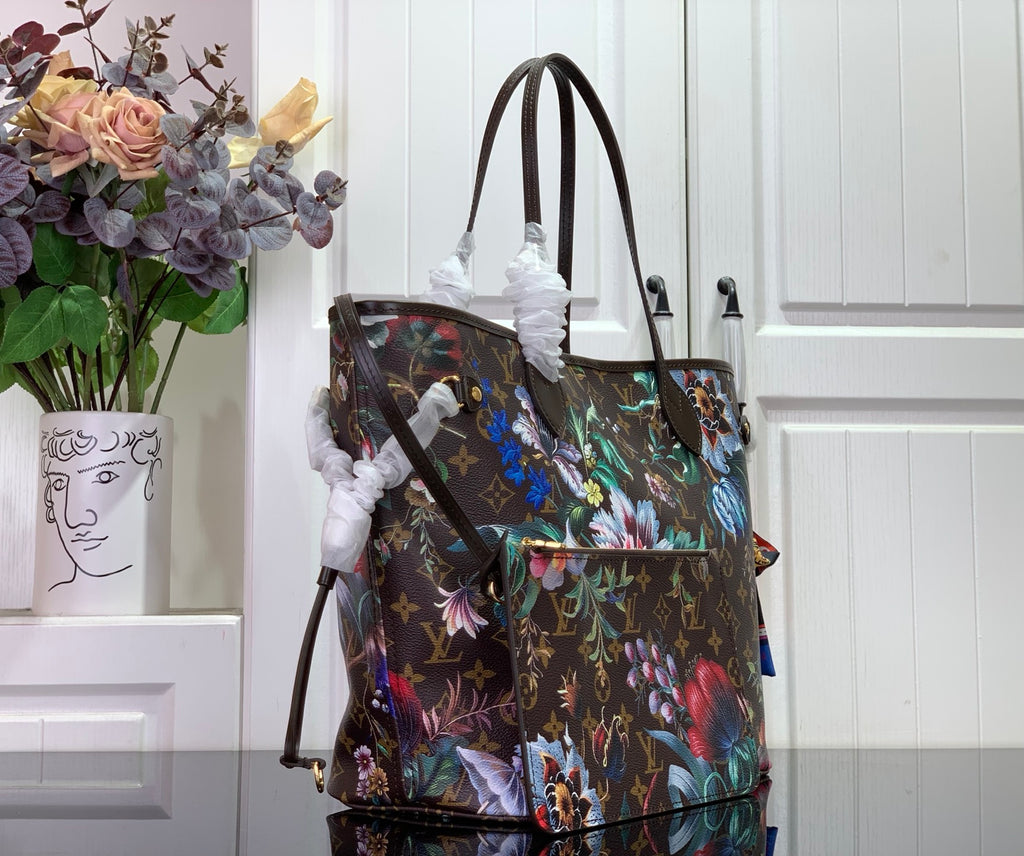 Louis Vuitton tote bag with colorful floral print, top handles, and side strap