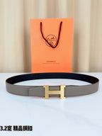 Grey leather belt with gold-tone H buckle, flat strap