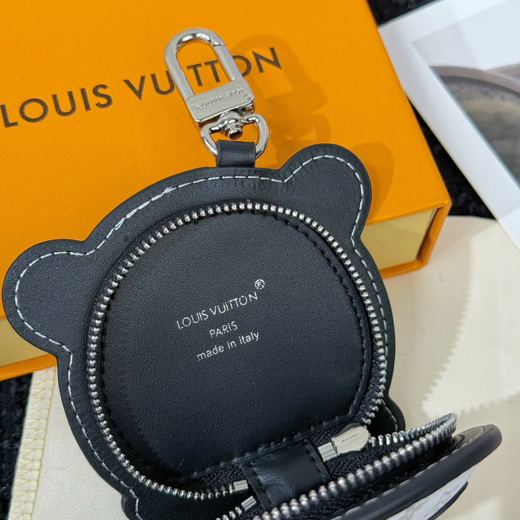 Louis Vuitton key pouch back side with zipper and printed Paris leather label
