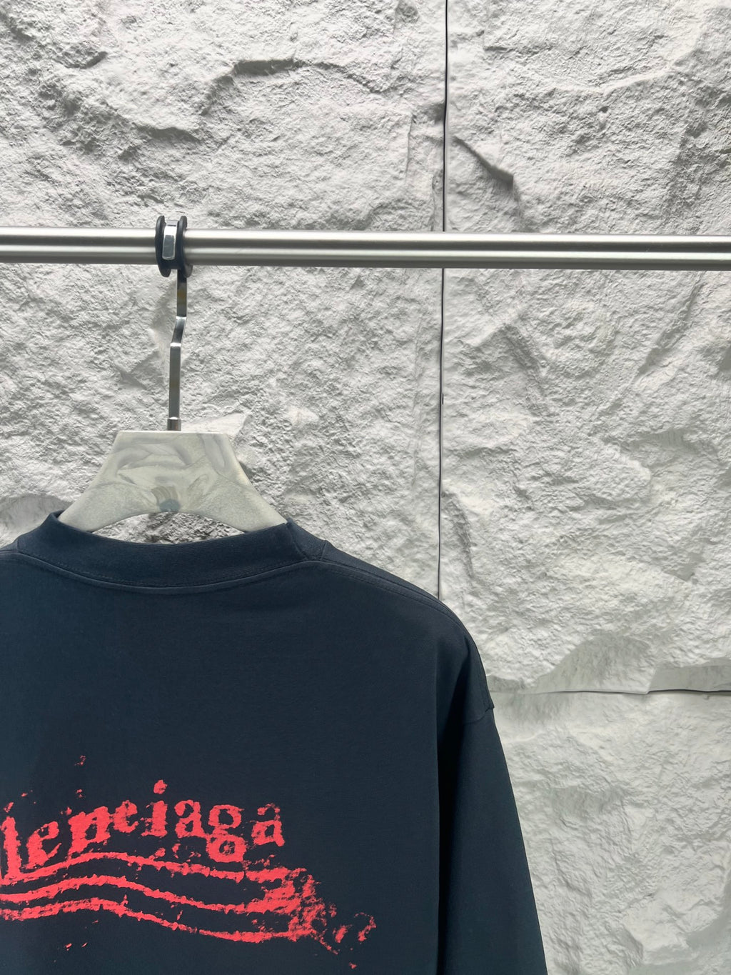 Balenciaga graphic T-shirt, dark navy, crew neck, close-up of left red logo graphic