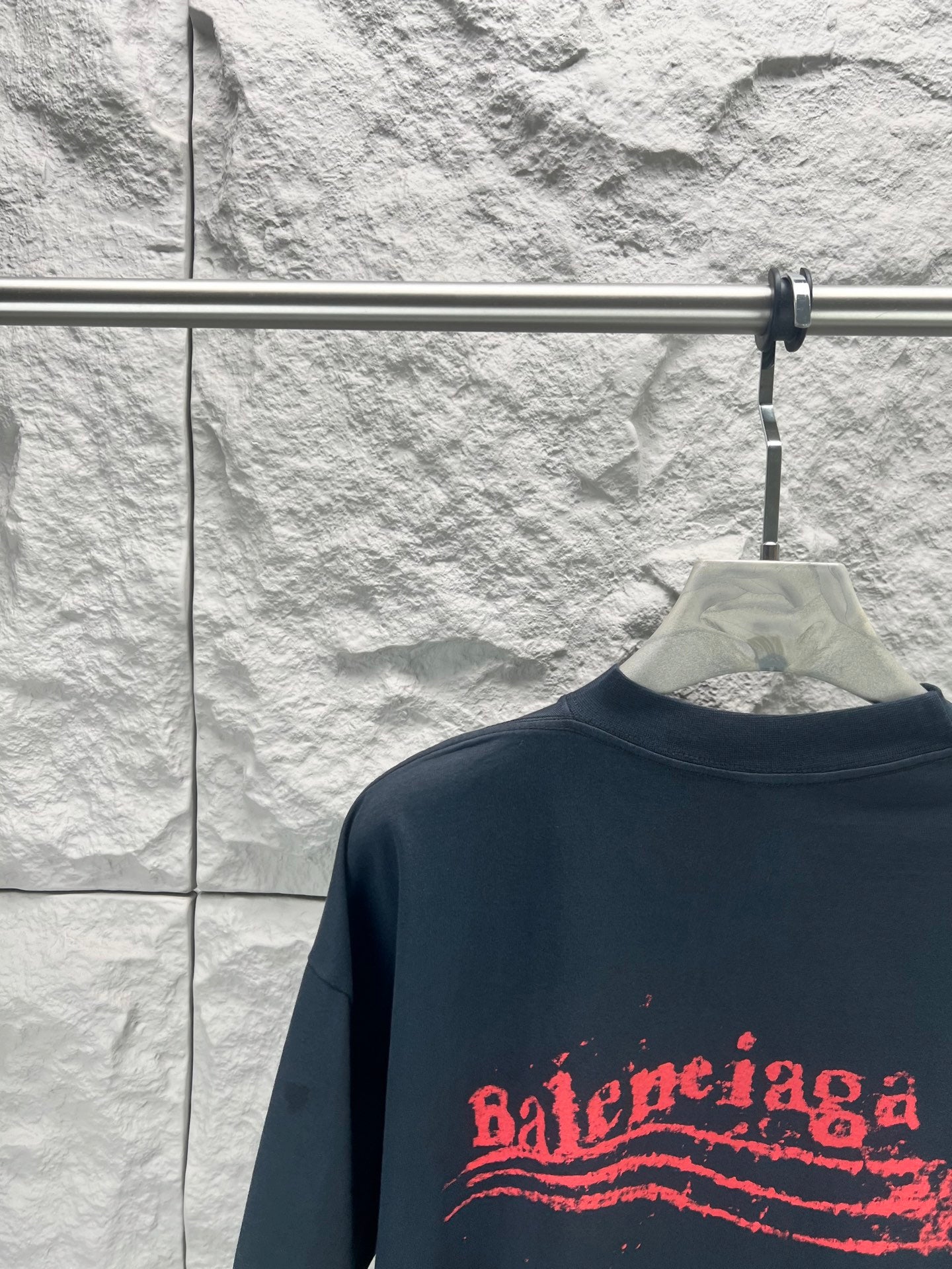 Balenciaga graphic T-shirt, dark navy, crew neck, close-up of red logo print