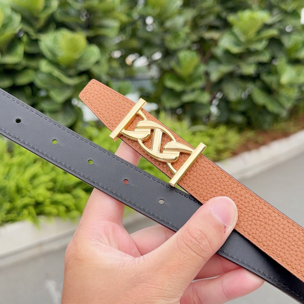 Hermes reversible belt: tan leather outer with gold buckle and dark inner side