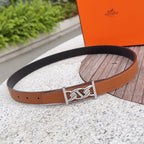 Hermes belt in tan leather with silver buckle and black lining
