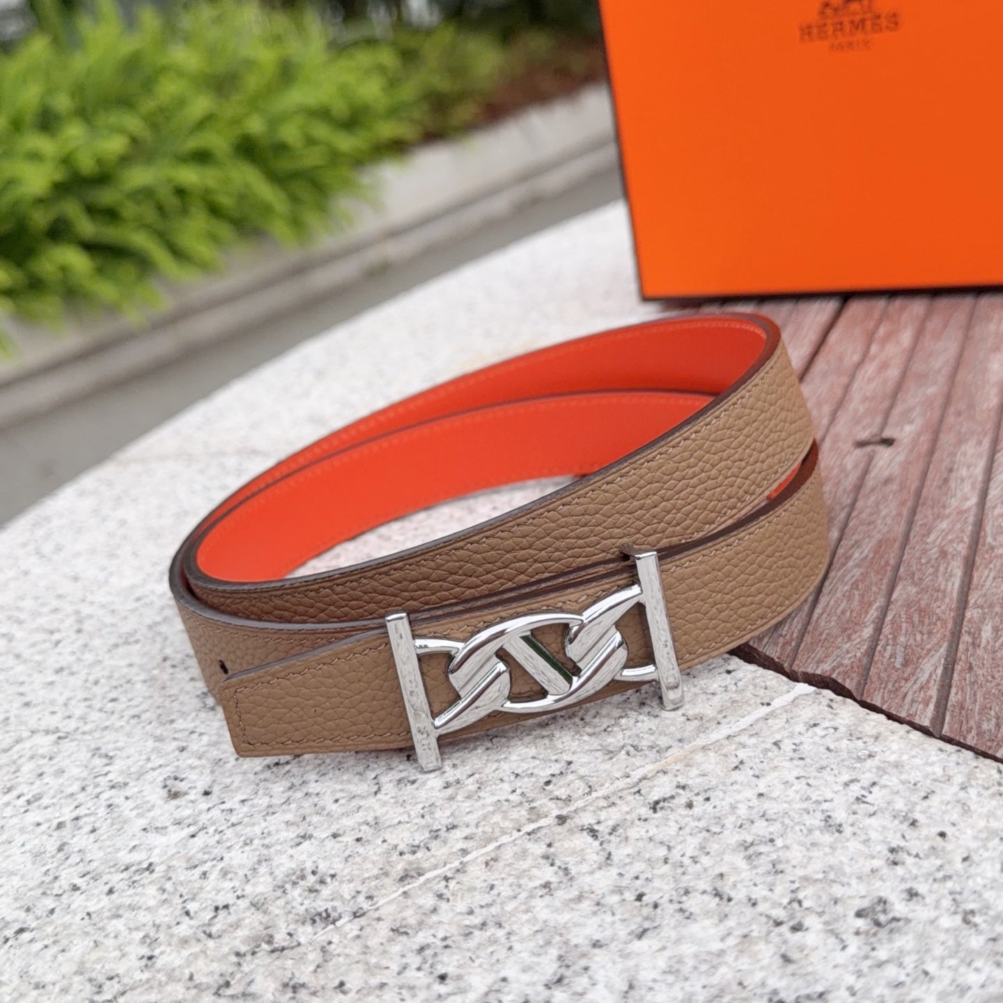 Leather belt with tan textured strap and silver buckle with keeper loop