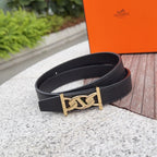 Leather belt with dark strap and gold-toned buckle clasp