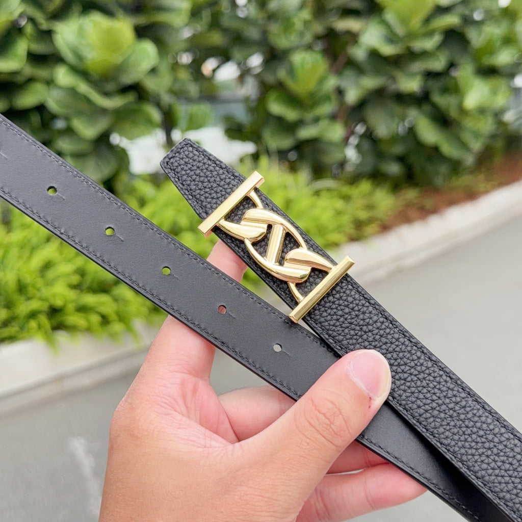 Leather belt with dark gray strap, gold-toned buckle, and punched holes