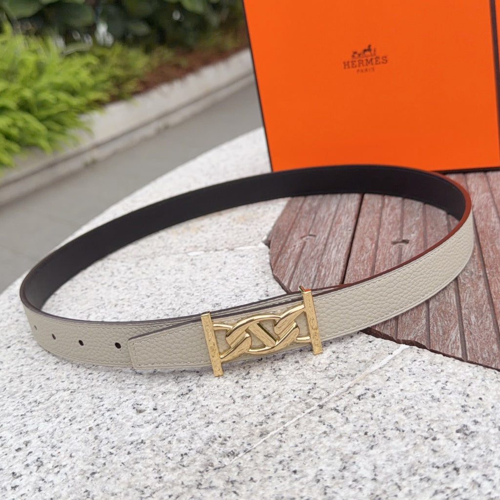Beige leather belt with gold-tone buckle and dark strap lining
