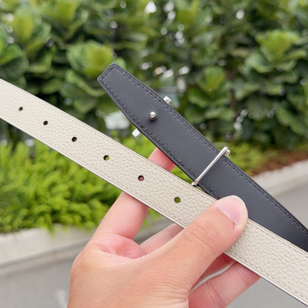 Hermes leather belt with light beige and dark gray straps, silver buckle and holes