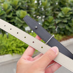 Hermes leather belt with light beige and dark gray straps, silver buckle and holes