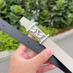 Hermes leather belt, light beige front with dark gray backing and silver buckle