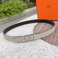 Hermes leather belt in light beige with silver H buckle and punched holes