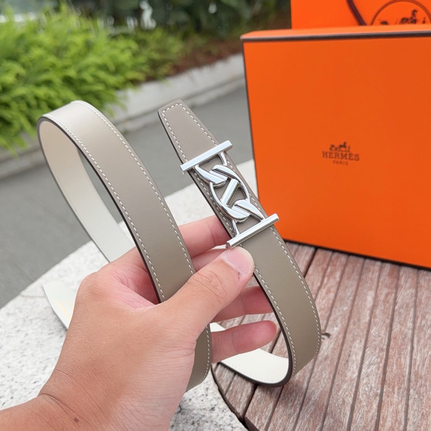 Hermes leather belt, taupe, silver-tone H buckle and keeper strap detail.