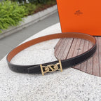 Leather belt with gold-tone buckle and dark blue strap, contrast white stitching