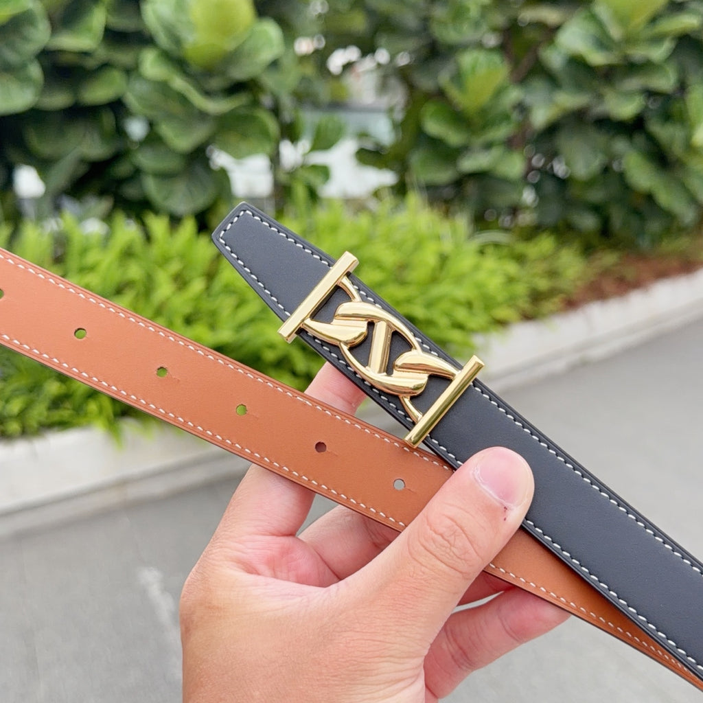 Leather belt with gold-tone buckle, dark blue strap and tan strap edge with holes