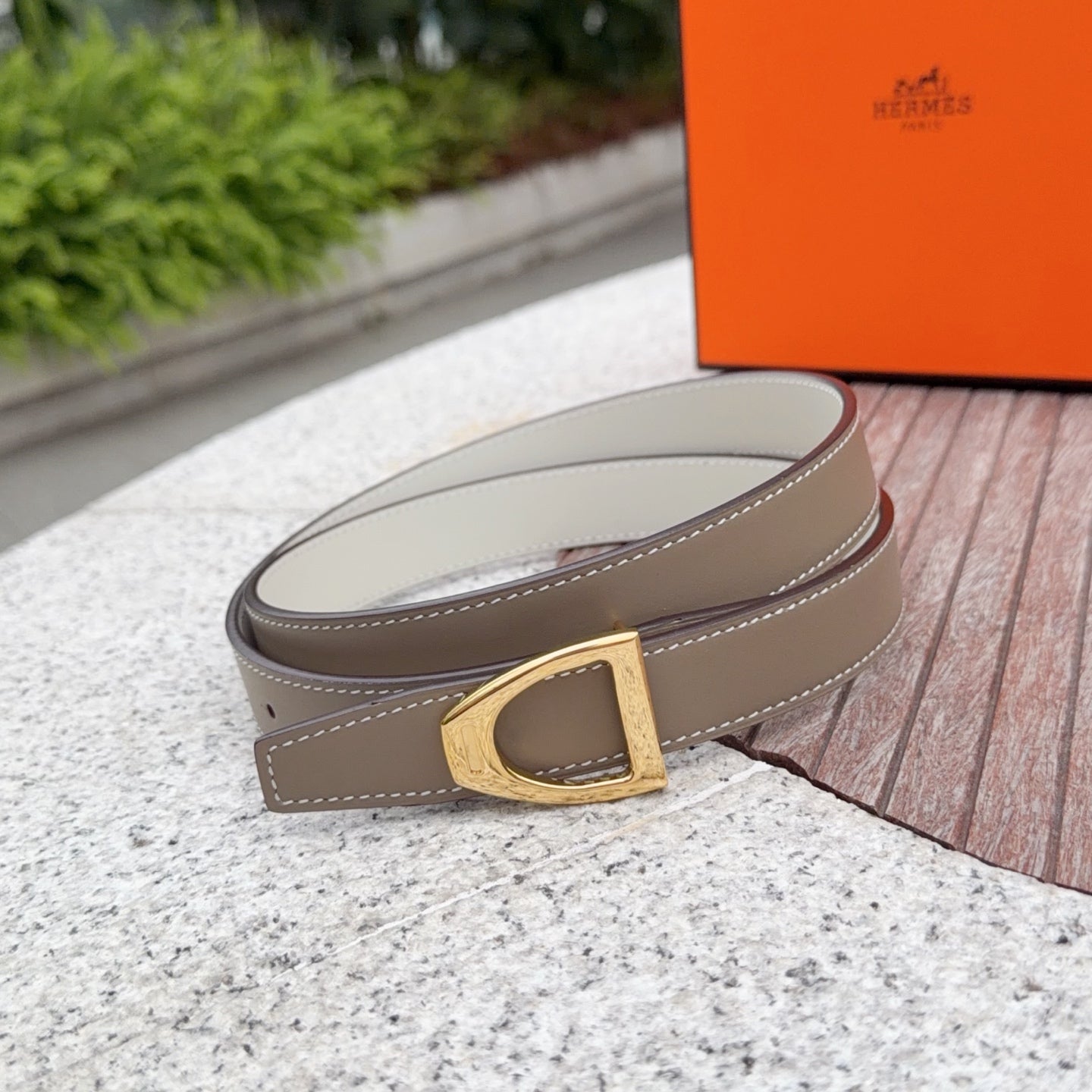 Taupe leather belt with gold-tone square buckle and neat double stitching