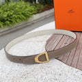Taupe leather Hermes belt with gold-tone square buckle and stitched edge