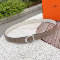 Hermes belt in light taupe leather with silver-tone buckle and stitched edges