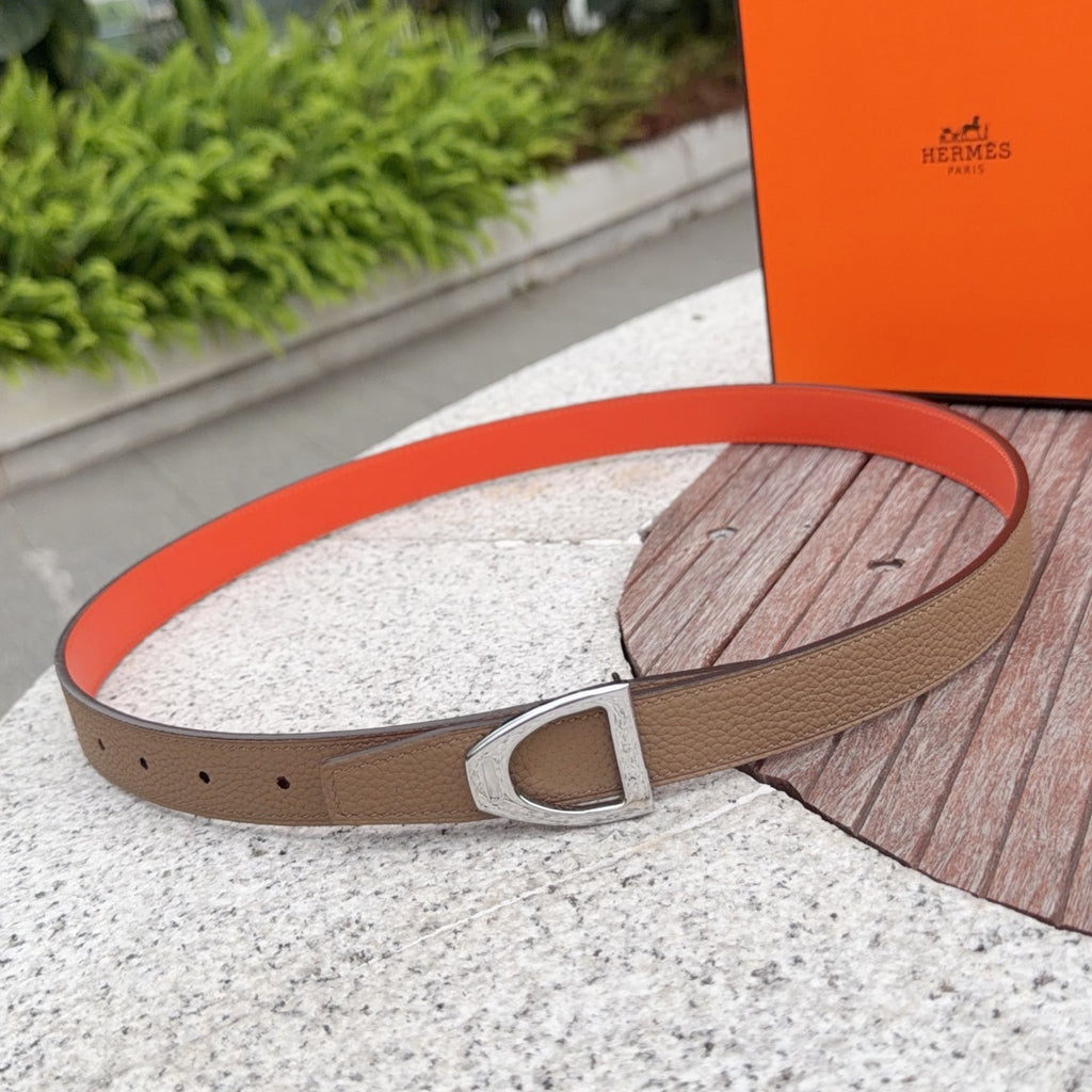 Brown leather belt with silver square buckle and orange interior