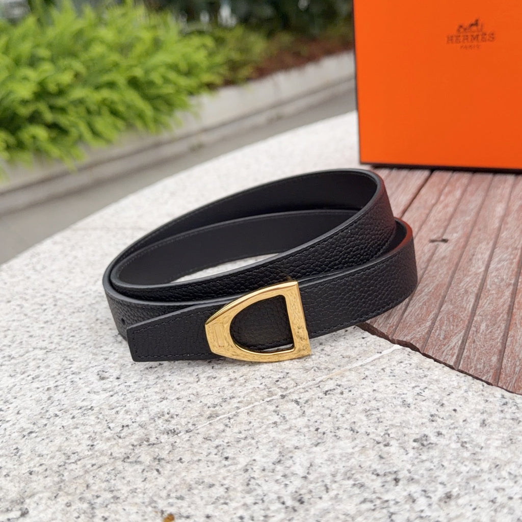 Black leather belt with gold-tone buckle and textured grain