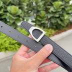 Dark gray leather belt with silver buckle and adjustment holes