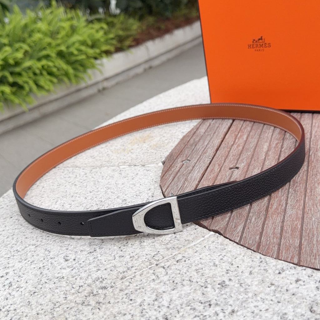 Black leather belt with silver-tone buckle and adjustable holes