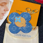 Louis Vuitton blue monogram flower keychain charm with beige emblem center and rings