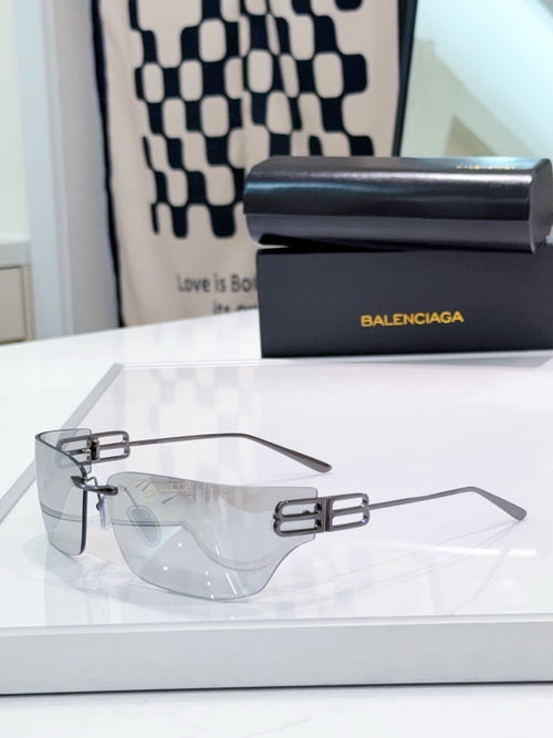 Balenciaga glasses with clear lenses and silver-tone geometric details