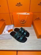 Hermes green leather slide sandals, two wide straps with silver buckle