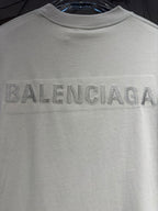 Balenciaga short-sleeve T-shirt close-up of large BALENCIAGA logo on chest