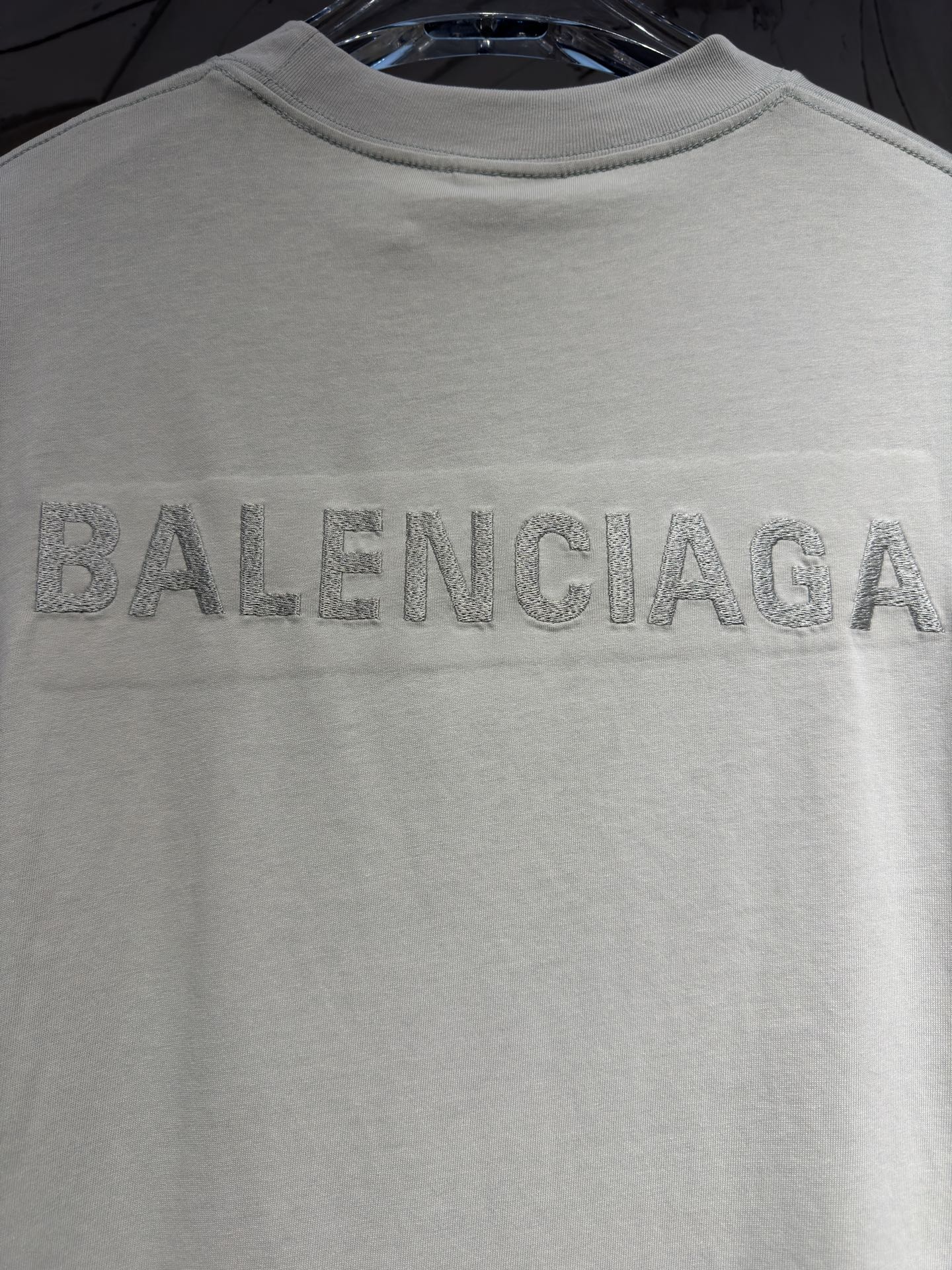 Balenciaga short-sleeve T-shirt close-up of large BALENCIAGA logo on chest