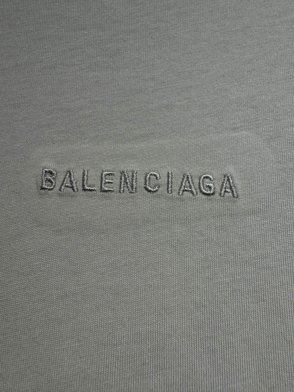 Balenciaga printed logo on light gray T-shirt fabric