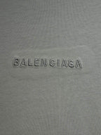 Balenciaga printed logo on light gray T-shirt fabric