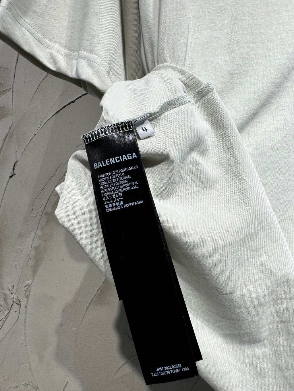 Balenciaga short-sleeve T-shirt care label tag at collar seam