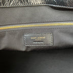 YSL SAINT LAURENT PARIS label on interior lining near zipper