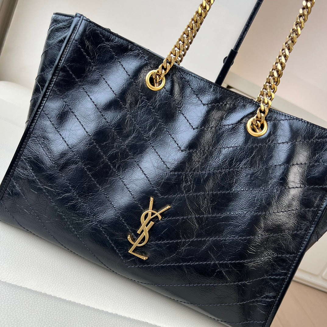 YSL quilted leather tote bag with gold YSL logo and chain strap rings