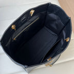 YSL quilted leather tote bag interior with zipper and gold snap hardware