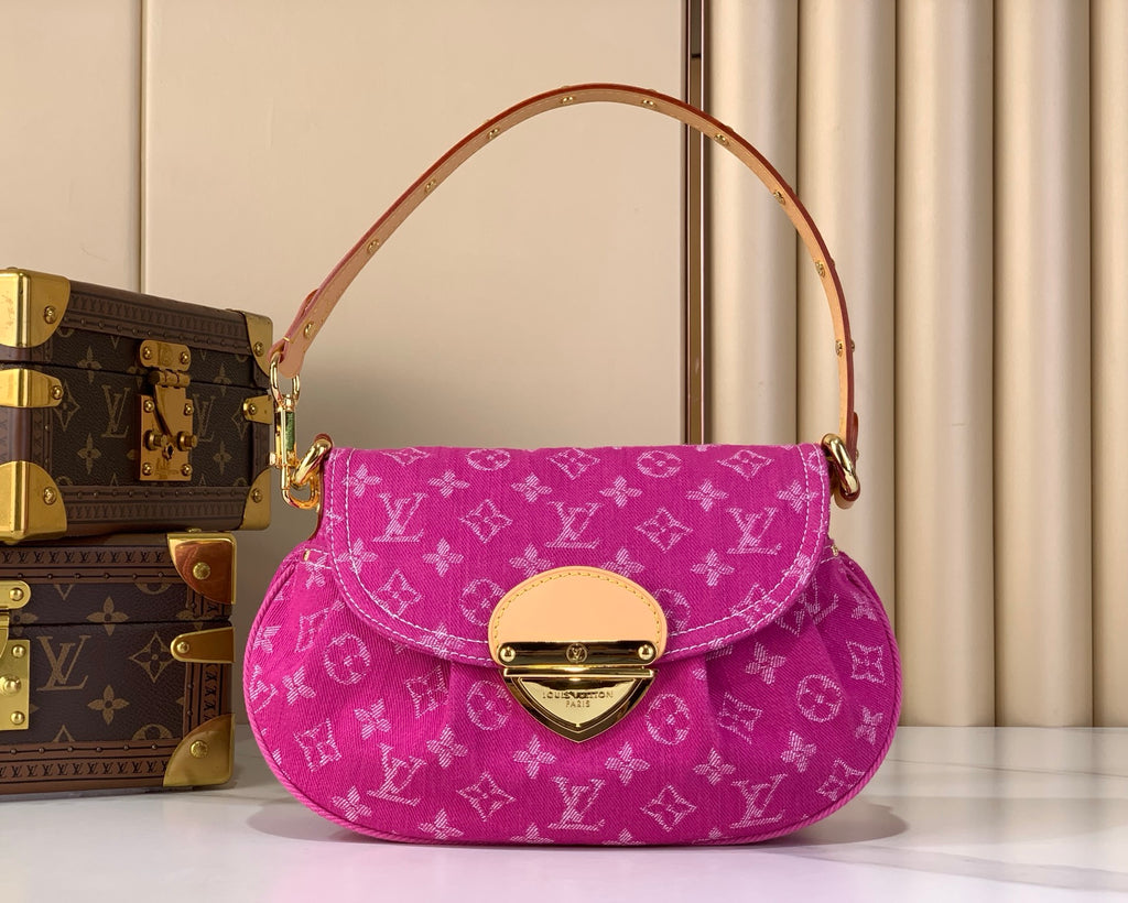 Louis Vuitton shoulder bag in fuchsia monogram canvas with top handle and gold hardware