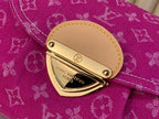 Louis Vuitton logo clasp on fuchsia monogram fabric flap with gold hardware