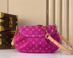 Louis Vuitton fuchsia monogram shoulder bag with front flap, long strap, and gold tone details