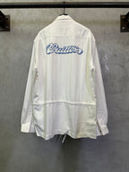 White long-sleeve jacket with back logo and drawstring hem