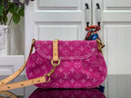 Louis Vuitton monogram handbag in magenta with shoulder strap and front flap