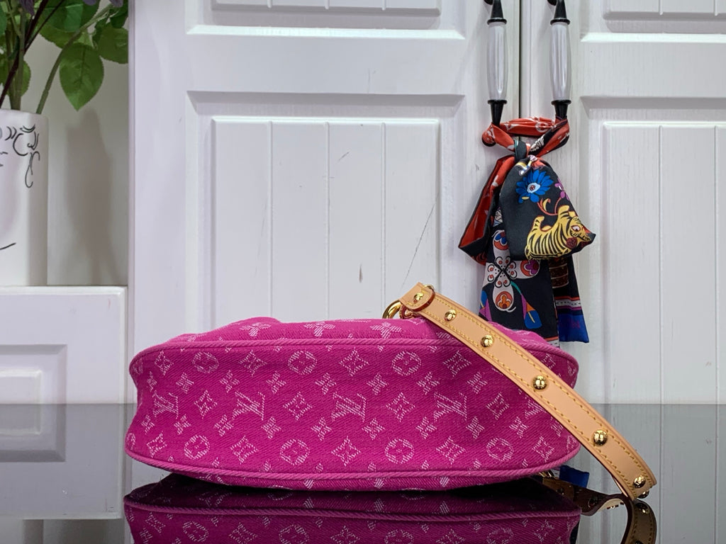 Louis Vuitton monogram handbag in magenta with long shoulder strap and gold hardware