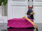 Louis Vuitton monogram handbag in magenta with long shoulder strap and gold hardware