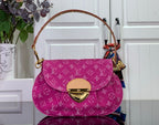 Louis Vuitton monogram handbag in magenta with flap and gold-tone hardware