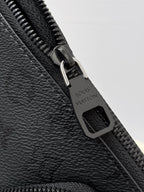 Louis Vuitton black zipper pull with engraved logo on monogram bag