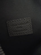 Louis Vuitton black leather interior pocket panel with embossed logo