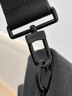 Louis Vuitton black strap hardware with engraved logo and D-ring