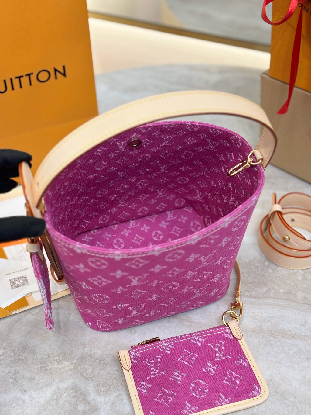 Purple monogram bucket bag open top with matching small card pouch