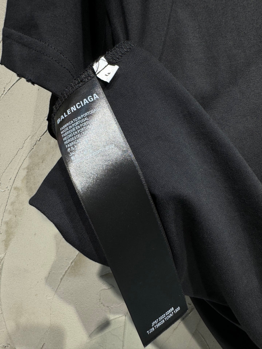 Black Balenciaga shorts with logo tag and printed side label